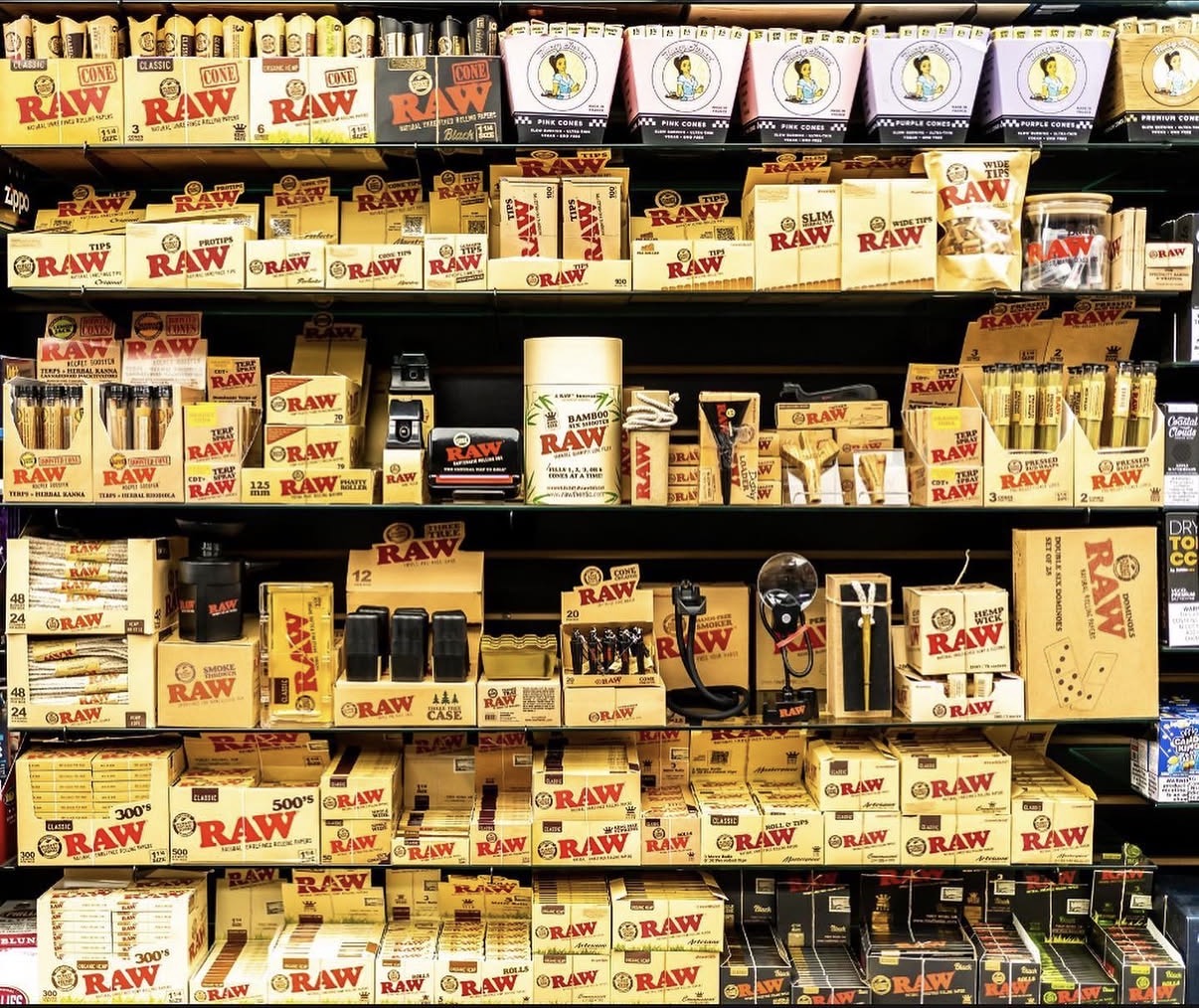 Luna's Smoke Shop RAW rolling papers wall